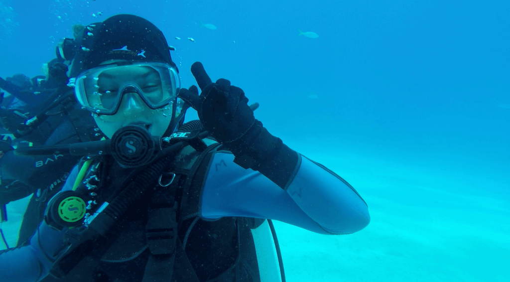 Apex predator Tiger Shark patrolling the seafloor at Tiger Beach, observed during a hands-on research and education mission.